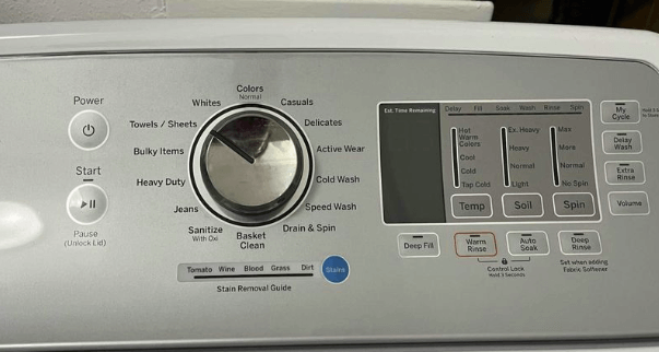 press pause button to reset GE washer